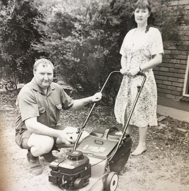 Paul and Maree Westcott with a lawn mower in the early years of the business